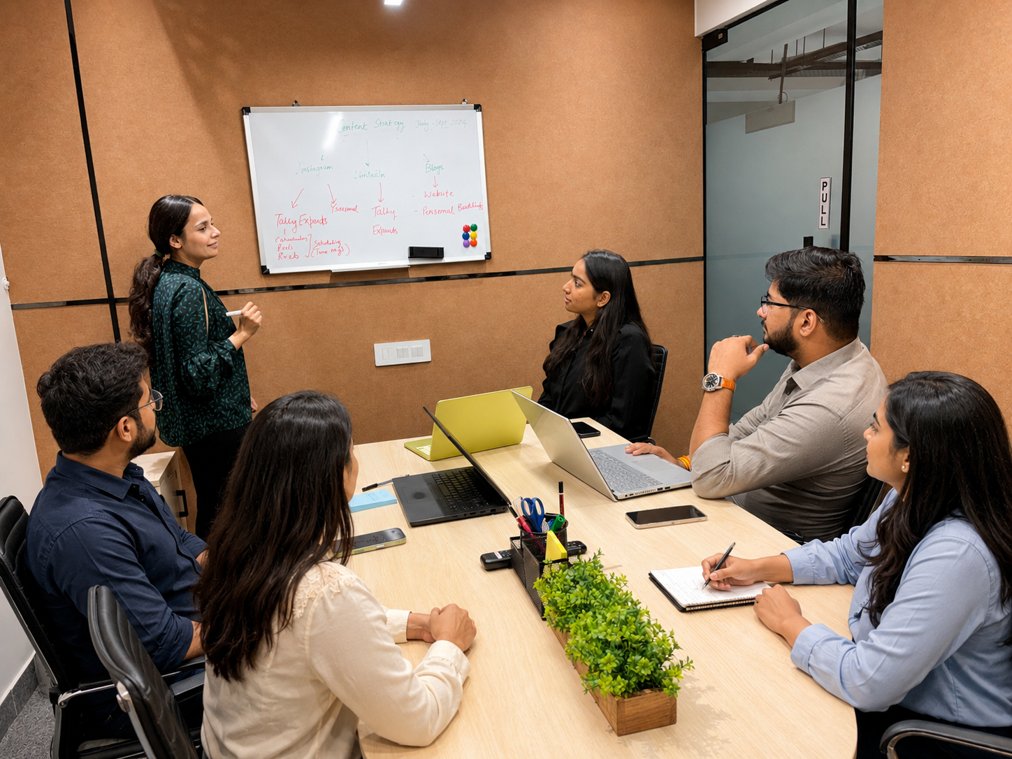 Tally Experts team discussing TallyPrime customization workflow in a meeting